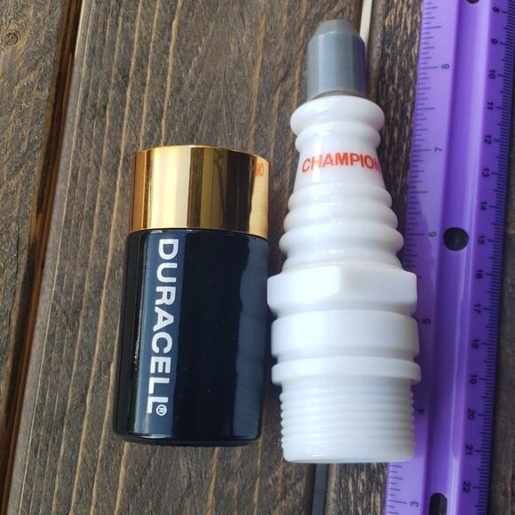 Avon Duracell and Champion Decor Set - Black, Gold, White - Picture 1 of 8